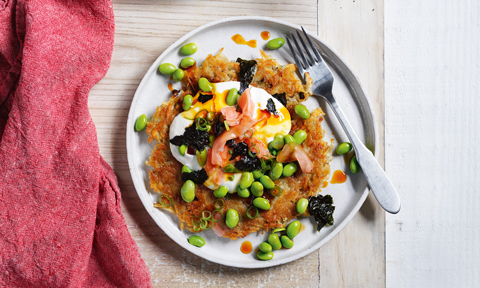 Potato pancake with teriyaki, spring onion, edamame and ginger on top