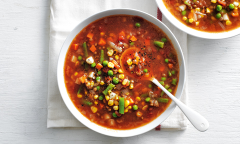 Vegetable and lentil soup served in a bowl