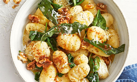 Gnocchi with burnt butter, walnuts and crispy sage served in a bowl
