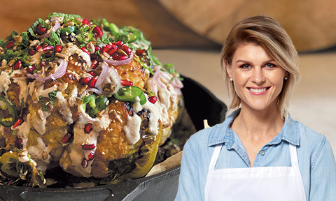 Roasted whole cauliflower with spring onion and pomegranate, with an image of Courtney Roulston in front