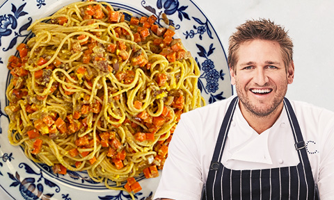 Close up shot of creamy carrot carbonara in a bowl with picture of Curtis Stone over the top