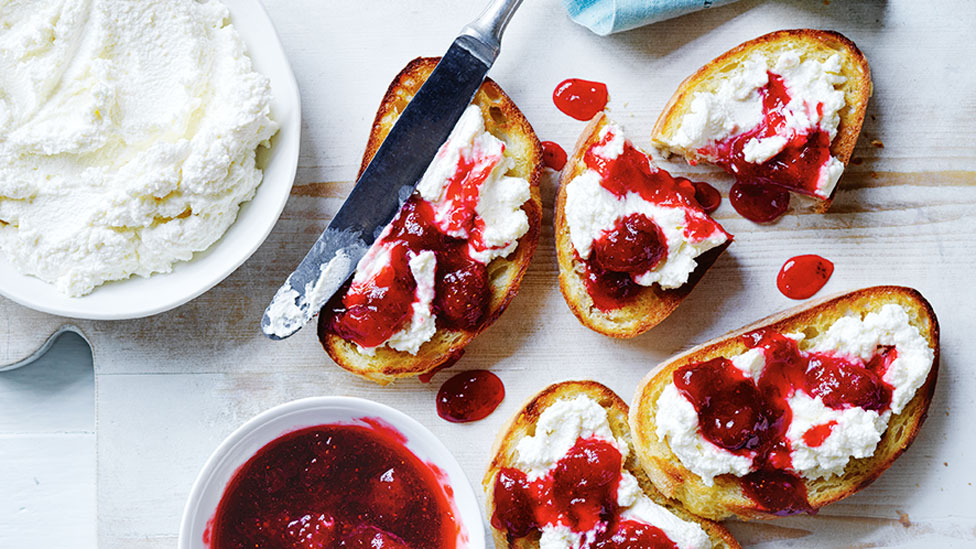 Four pieces of ultimate toast with ricotta and jam