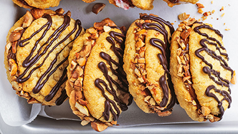 Four gooey choc-caramel cookies