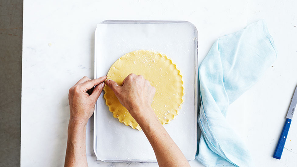 Use fingertips to pinch the dough edge