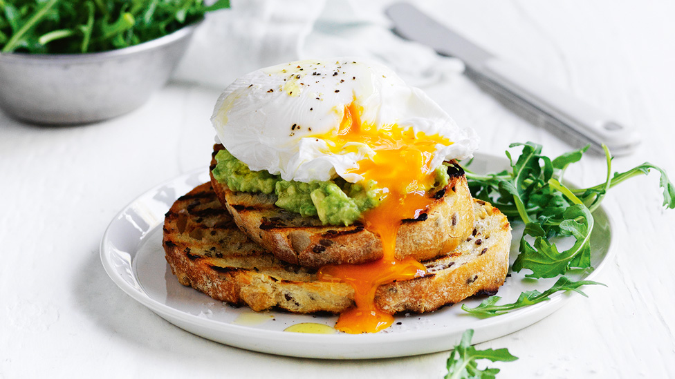 Poached eggs with avocado on wholegrain toast 