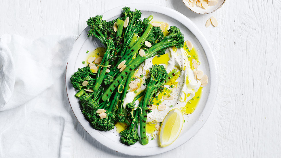 Baby broccoli and lemon wedges