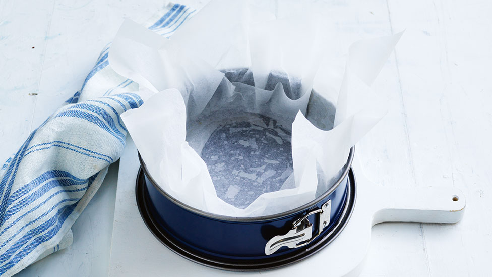 A baking dish lined with paper