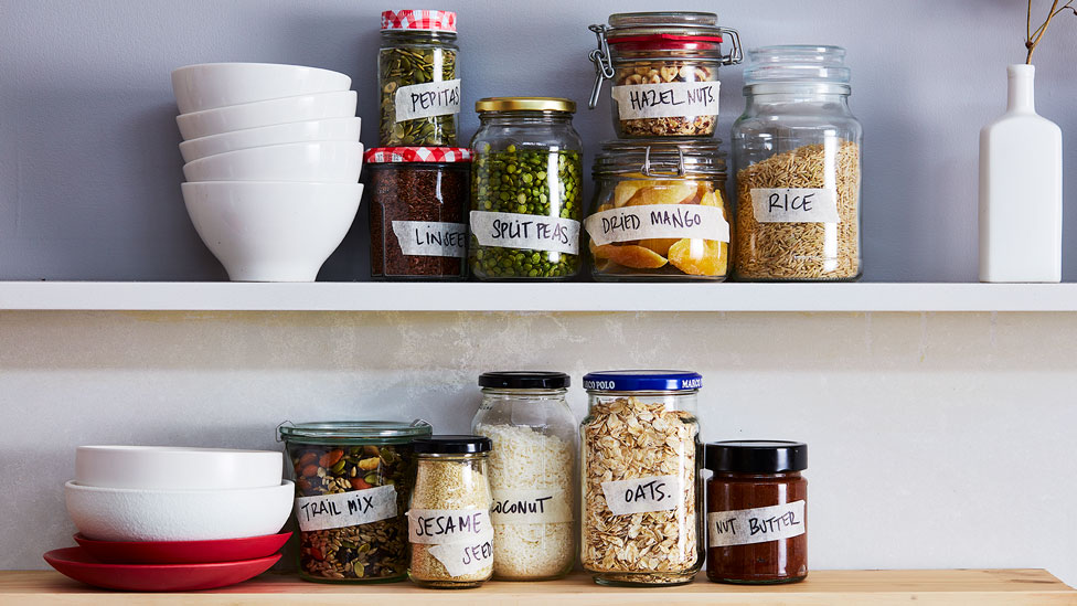 Jars and dishes on the kitchen shelf