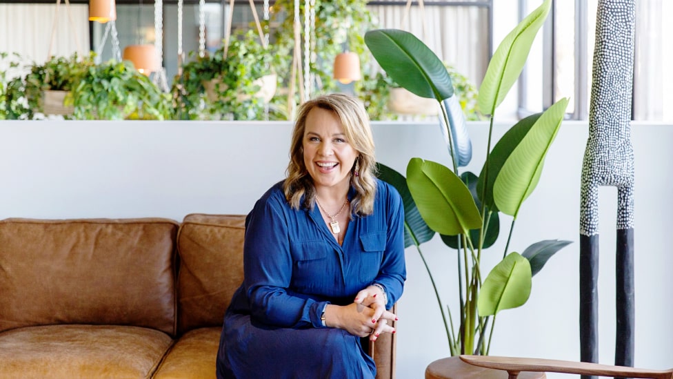 Carolyn Creswell sitting on a couch