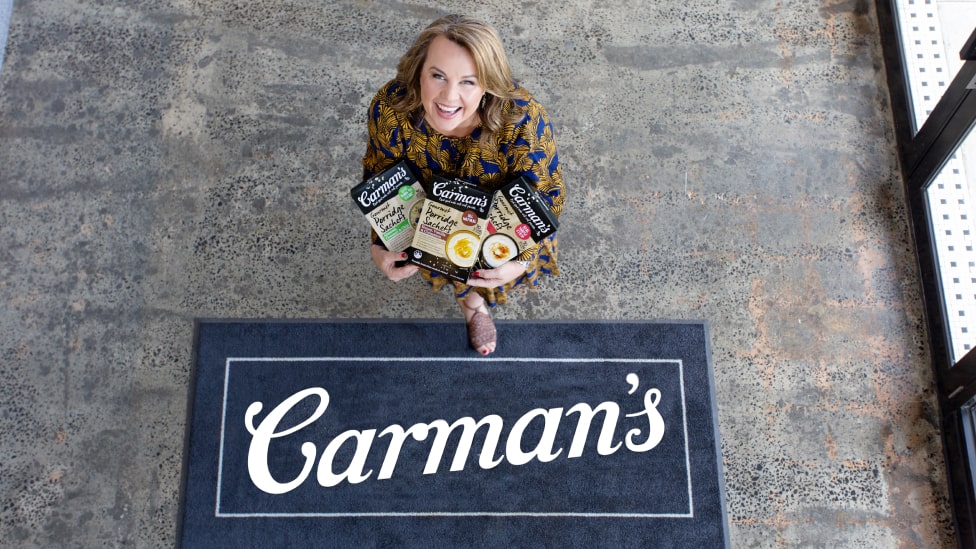 Carolyn Creswell carrying Carman's products