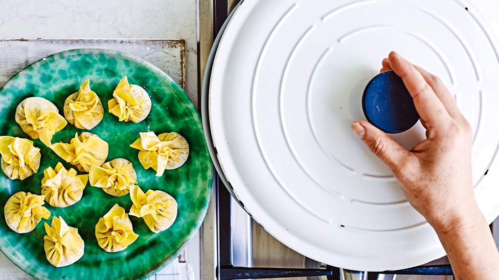 Frying a batch of dumplings