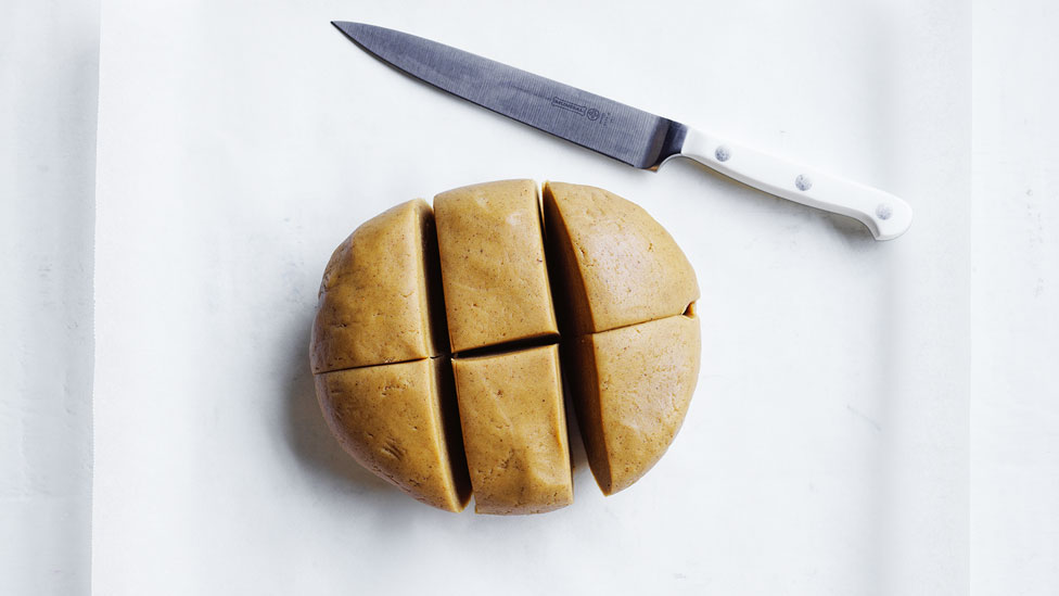Cut the dough into six portions