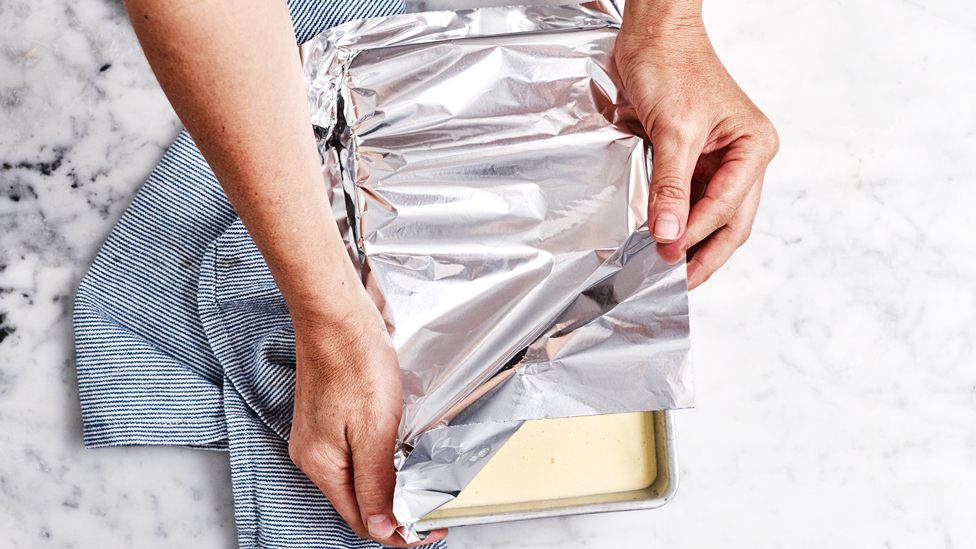 Covering the ice cream container with foil