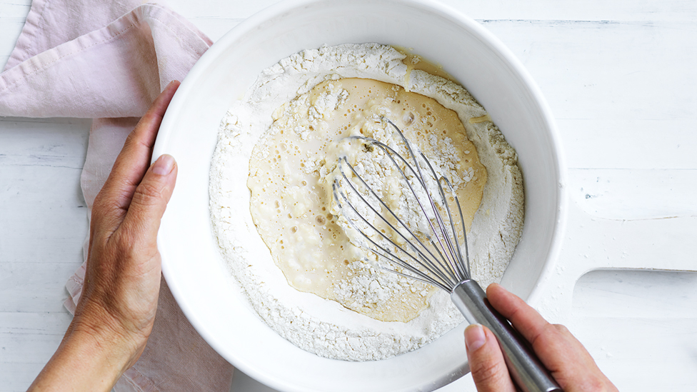 Whisking pancake mixture