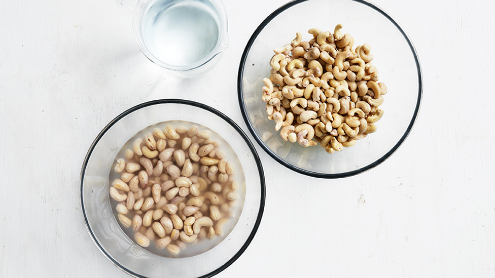 Soaking cashews in boiling water