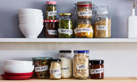 Jars and dishes on the kitchen shelf