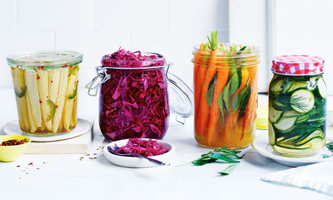 Four jars of pickled vegetables