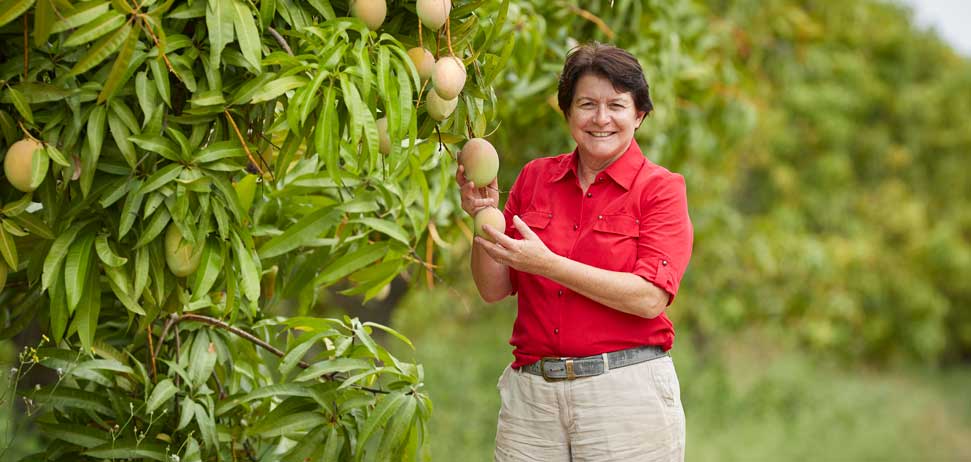 Farmer with fruit produce