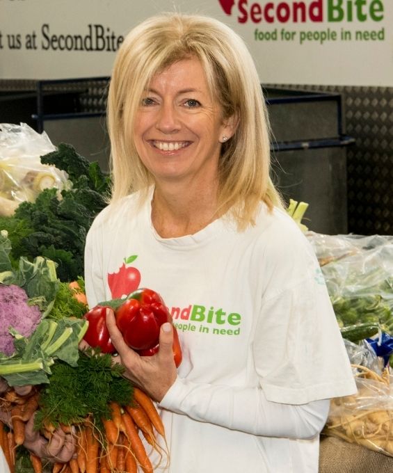 Simone Carso holding fresh vegetables