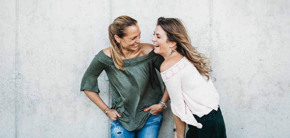 Two woman laughing 