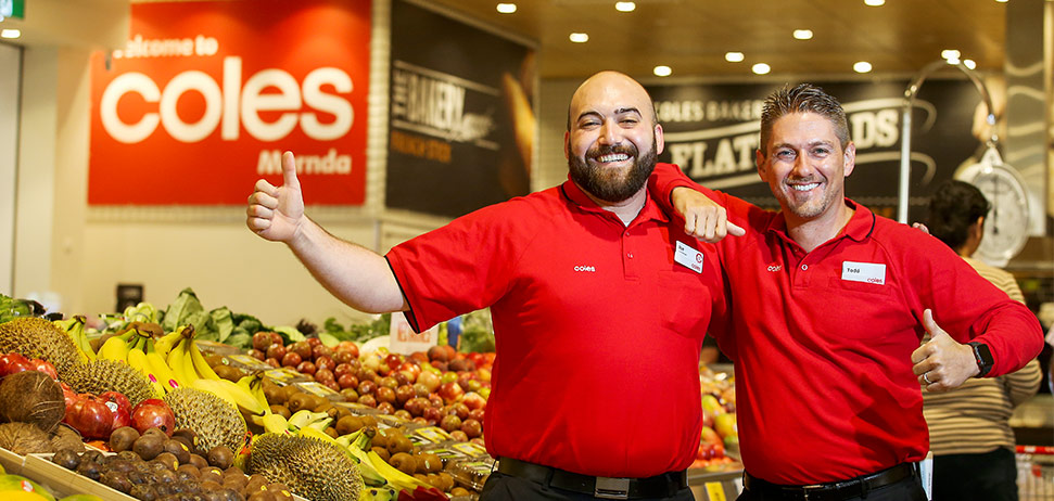 Two Coles staff members