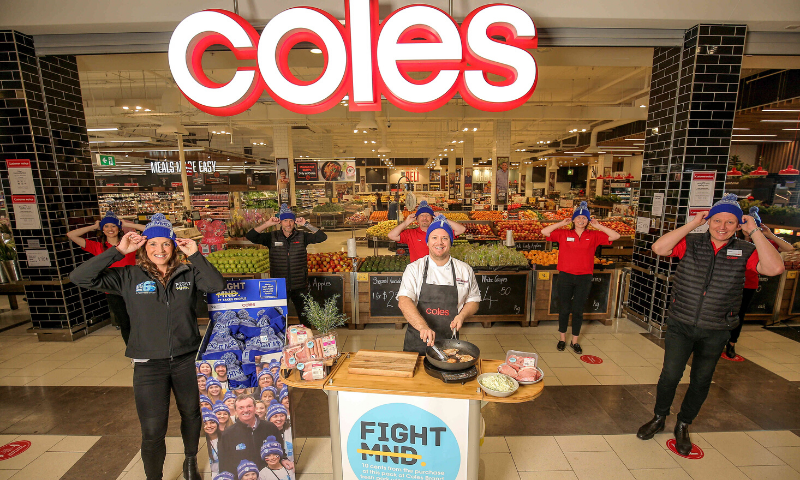Bec Daniher and the team at Coles where funds are being raised for FightMND