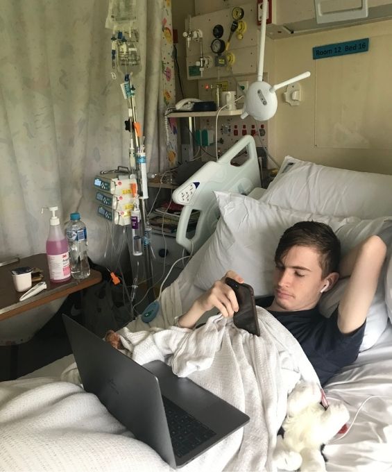 A teenager in a hospital bed