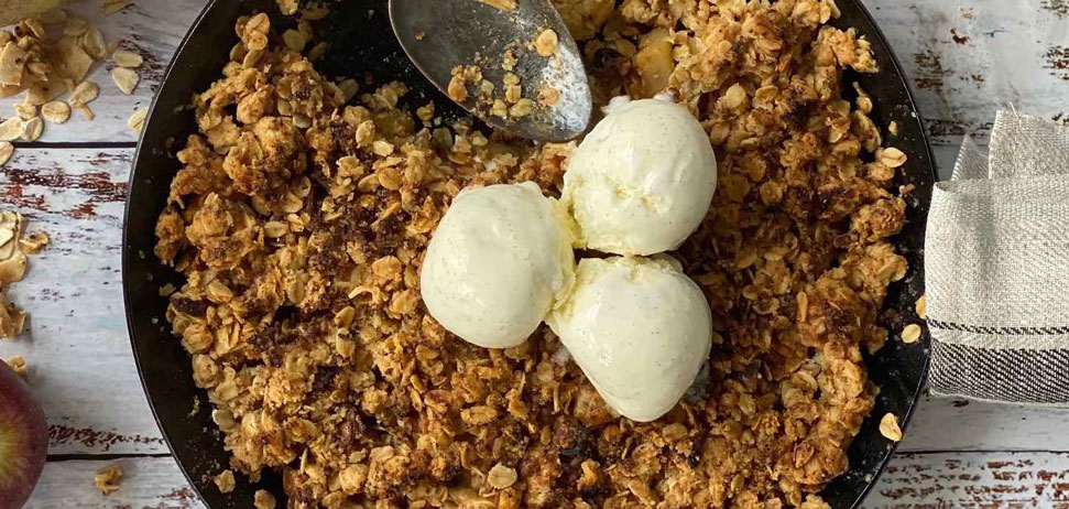 Apple crumble with ice cream on top using Farmer Jo muesli